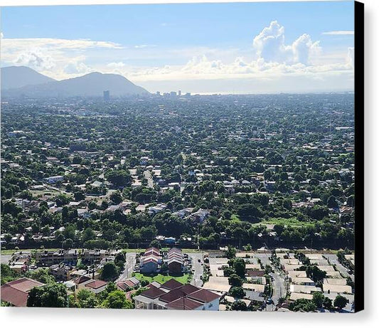 Expansive Cityscape Under Blue Skies - Canvas Print