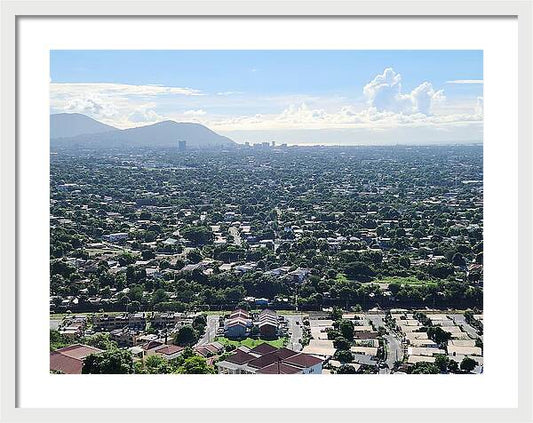 Expansive Cityscape Under Blue Skies - Framed Print