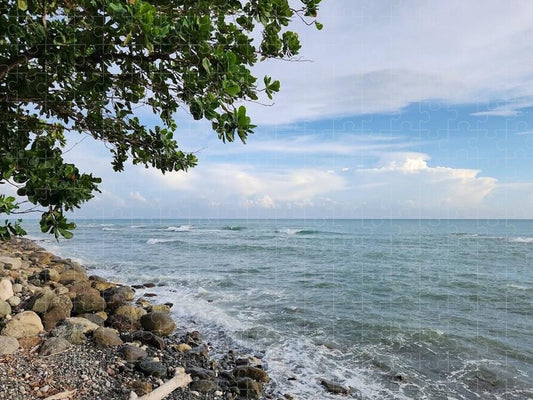 Serene Rocky Beach Scene - Puzzle