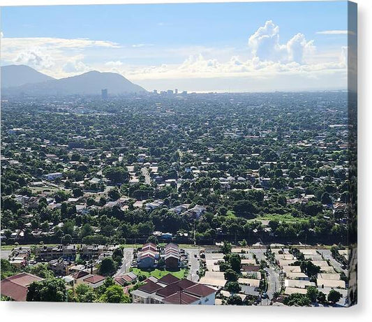 Expansive Cityscape Under Blue Skies - Canvas Print