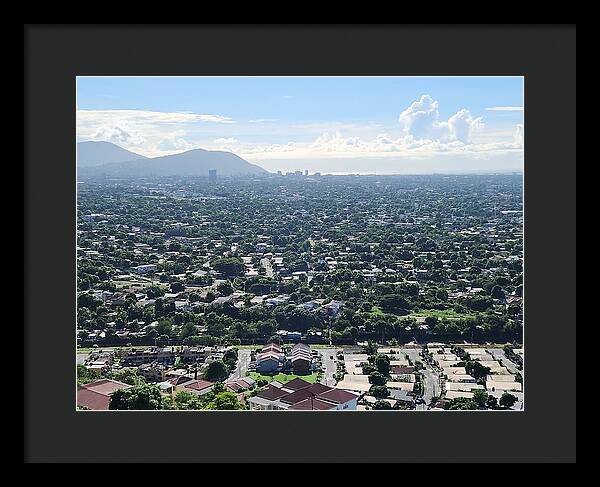 Expansive Cityscape Under Blue Skies - Framed Print