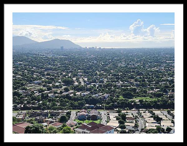 Expansive Cityscape Under Blue Skies - Framed Print