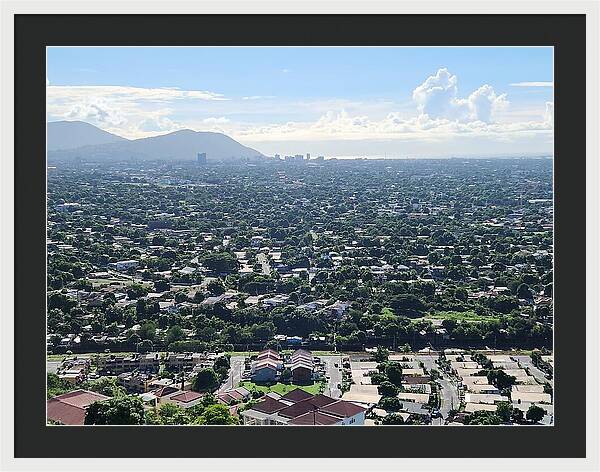 Expansive Cityscape Under Blue Skies - Framed Print