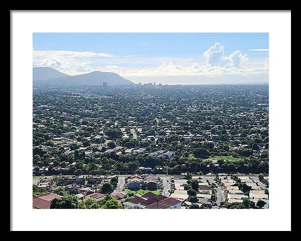 Expansive Cityscape Under Blue Skies - Framed Print