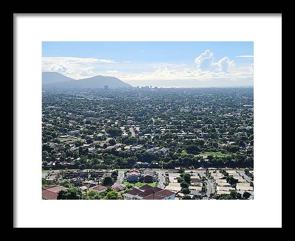 Expansive Cityscape Under Blue Skies - Framed Print