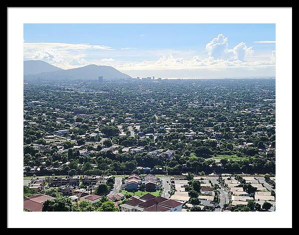 Expansive Cityscape Under Blue Skies - Framed Print