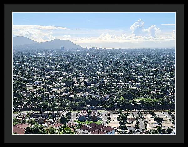 Expansive Cityscape Under Blue Skies - Framed Print