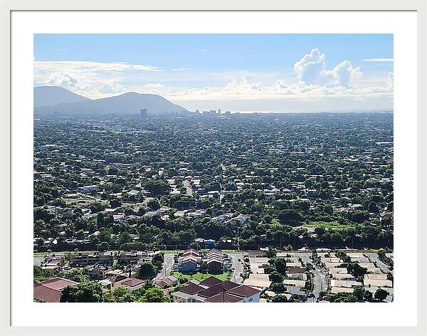 Expansive Cityscape Under Blue Skies - Framed Print