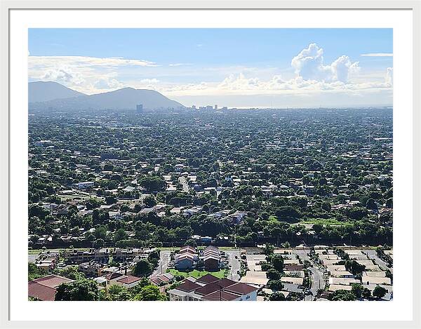Expansive Cityscape Under Blue Skies - Framed Print