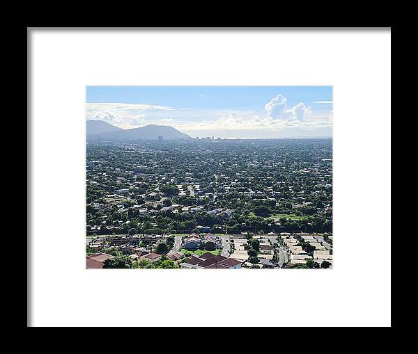 Expansive Cityscape Under Blue Skies - Framed Print