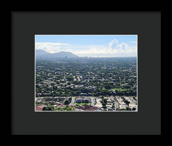 Expansive Cityscape Under Blue Skies - Framed Print